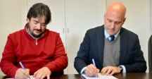 Autoridades firmando convenio 